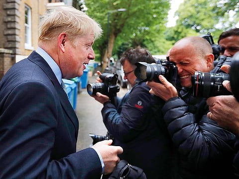 British Conservative Party lawmaker Boris Johnson leaves his home in London, Thursday, June 13, 2019.