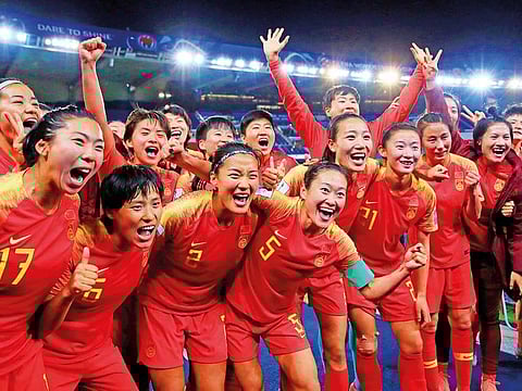 China kept hopes of automatic progression to the knockout stages alive after beating South Africa.