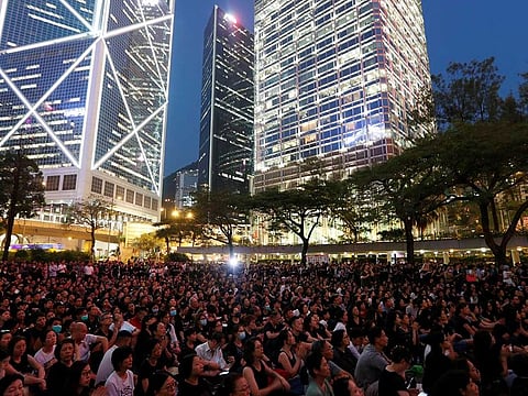 People attend a rally in support of demonstrators protesting against proposed extradition bill with China, in Hong Kong,