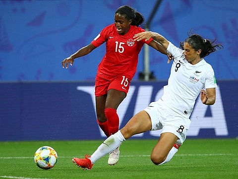 Canada's Nichelle Prince in action with New Zealand's Abby Erceg.