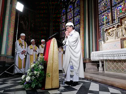 The Archbishop of Paris Michel Aupetit leads the first mass in a side chapel, two months after a devastating fire engulfed the Notre-Dame de Paris cathedral, Saturday June 15, 2019, in Paris.
