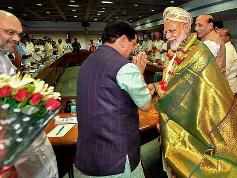 Prime Minister Narendra Modi is felicitated by BJP leaders during party's parliamentary party executive committee meeting ahead of the budget session of Parliament, in New Delhi.