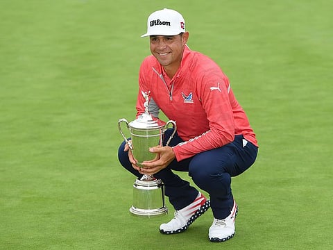 Gary Woodland of the United States poses with the trophy after winning the 2019 US Open at Pebble Beach.