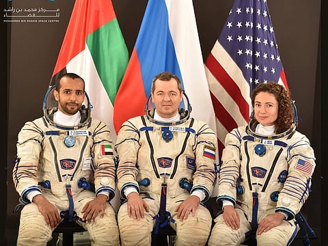 Hazza Al Mansouri with primary crewmates Oleg Skripochka and Jessica Meir