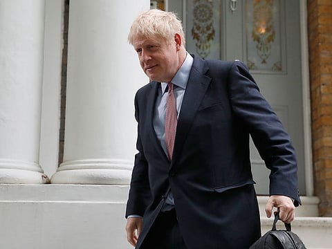 British Conservative party lawmaker Boris Johnson leaves home in south London.