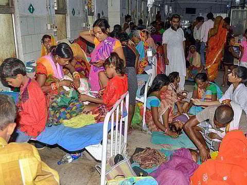 Children showing symptoms of Acute Encephalitis Syndrome (AES) being treated at a hospital, in Muzaffarpur district, Wednesday, June 19, 2019.