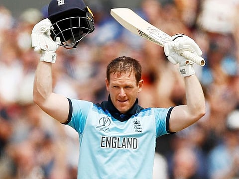 England's captain Eoin Morgan celebrates his century against Afghanistan during their World Cup match.