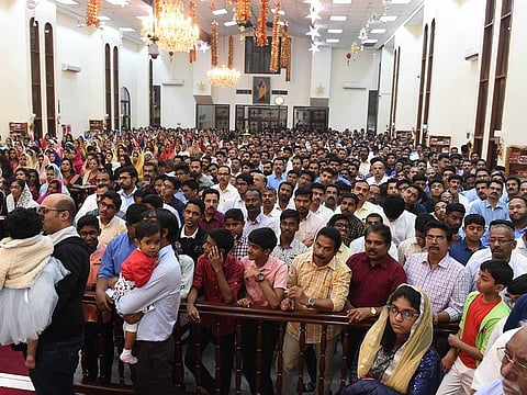 The members of Christian Community attend the Christmas Mass at St. George Orthodox Church in Abu Dhabi.