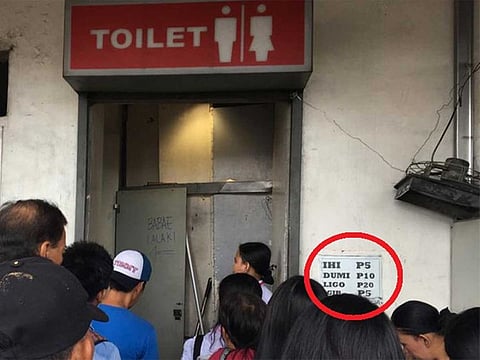 Serpentine queues: A pay-to-pee sign outside a toilet at the busy Alabang bus terminal. Picture taken on June 1, 2019. It states: "Urinate: 5 pesos"; "Defecate: 10 pesos"; "Bath: 20 pesos"; "Refill water: 5 pesos"