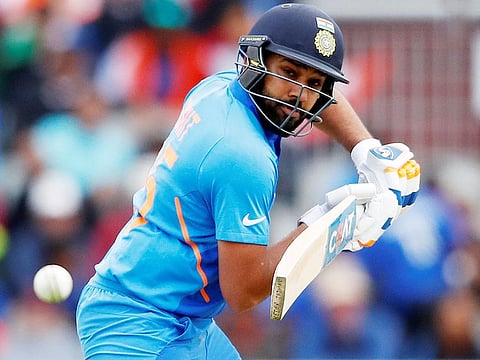 India's Rohit Sharma plays a shot during the World Cup group stage match against Pakistan at Old Trafford in Manchester.