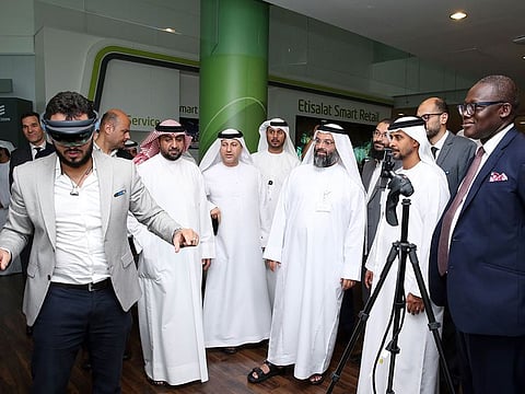 Senior etisalat officials at a recent virtual reality demonstration with 5G. The UAE telco was the first operator to launch a commercial 5G wireless network in the MENA territory last year.