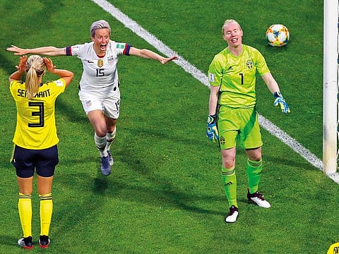 Megan Rapinoe (centre) celebrates, after United States teammate Tobin Heath scored her side’s second goal, during their match against Sweden.