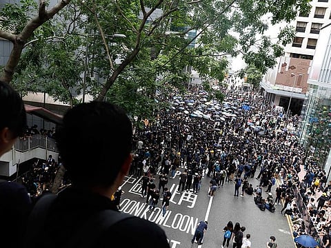 Protesters gather outside the police headquarters during a demonstration in Hong Kong, China, on Friday, June 21, 2019.