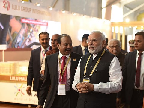 Yusuffali M.A. is seen here with Indian Prime Minister Narendra Modi at the inaugural UP Investors Summit where the miniature model of the LuLu Mall in Lucknow was unveiled