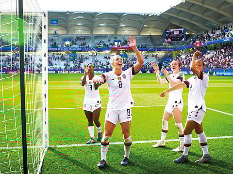 From left: Crystal Dunn, Julie Ertz, Rose Lavelle and Mallory Pugh of the US team greet fans after their Women’s World Cup round of 16 match against Spain on Monday.