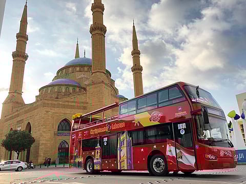 City Sightseeing bus in front of Al Amin Mosque.