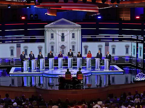Democratic presidential candidates New York City Mayor Bill De Blasio (L-R), Rep. Tim Ryan (D-OH), former housing secretary Julian Castro, Sen. Cory Booker (D-NJ), Sen. Elizabeth Warren (D-MA), former Texas congressman Beto O’Rourke, Sen. Amy Klobuchar (D-MN), Rep. Tulsi Gabbard (D-HI), Washington Gov. Jay Inslee, and former Maryland congressman John Delaney take part in the first night of the Democratic presidential debate on June 26, 2019 in Miami, Florida.