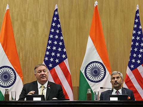 Mike Pompeo, U.S. secretary of state, left, speaks beside S Jaishankar, India's foreign minister, during a news conference at the Ministry of Foreign Affairs in New Delhi, India