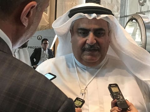 Bahrain Foreign Minister Khalid Ben Ahmed al-Khalifah speaks to the press upon his arrival to the Peace to Prosperity workshop in the Bahraini capital Manama, on June 25, 2019.