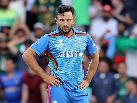 Afghanistan's captain Gulbadin Naib reacts after a delivery during the Cricket World Cup match between Pakistan and Afghanistan at Headingley in Leeds, England, Saturday, June 29, 2019.