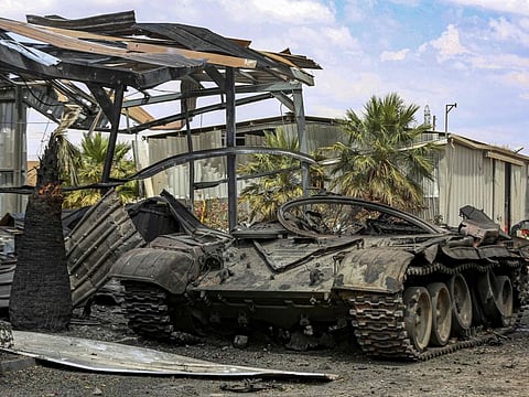 This picture taken on June 28, 2019 shows the husk of a destroyed tank found at a camp that was used by forces loyal to Libya's Khalifa Haftar in Gharyan, 100km southwest of Tripoli.