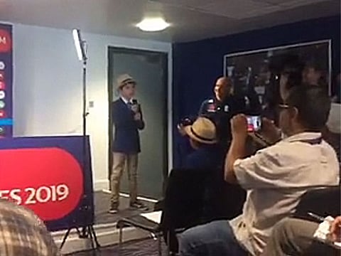 A boy named Edward presented the captains to the media.