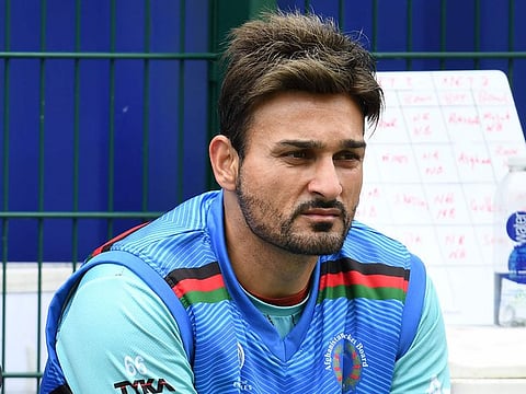Afghanistan's Hamid Hasan take part in a training session at Old Trafford Cricket Ground in Manchester.