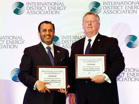 Ahmad Bin Shafar, CEO of Empower, receives the award.