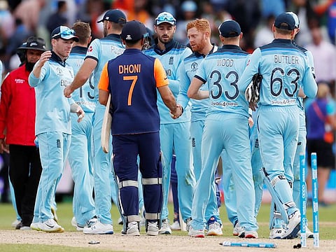 India's MS Dhoni shakes hands with England's Jonny Bairstow at the end of the match.