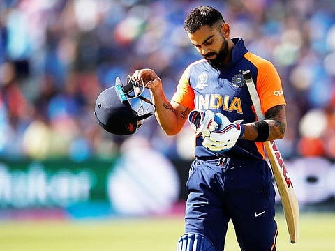 India's Virat Kohli looks dejected as he walks off after losing his wicket during the match against England at Edgbaston, Birmingham.