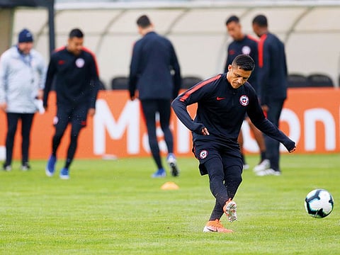 Chile’s Alexis Sanchez during a training session ahead of the Copa America semi-final against Peru in Porto Alegre yesterday. The champions face Peru for a place in the final.