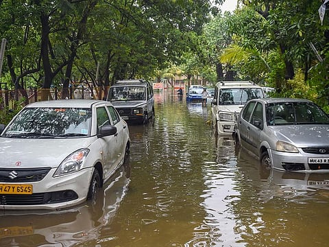 Cars are pictured on waterlogged street in Mumbai on July 2, 2019, following heavy monsoon rains. Mumbai was lashed by heavy rains for a second consecutive day, bringing the city to a virtual standstill.