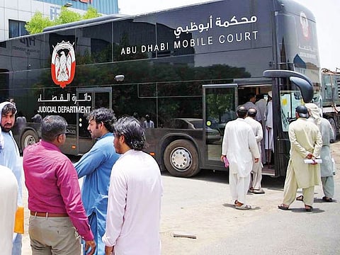 The mobile court bus at a workers’ accommodation in Musaffah where officials addressed labour disputes. Photo for illustrative purpose only.
