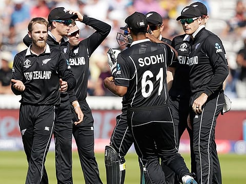 New Zealand's captain Kane Williamson , second left celebrates after taking the wicket of Australia's Alex Carey during their match at Lord's cricket ground in London, on June 29, 2019.