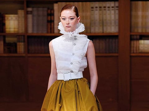 A model presents a creation by Chanel during the Women's Fall-Winter 2019/2020 Haute Couture collection fashion show