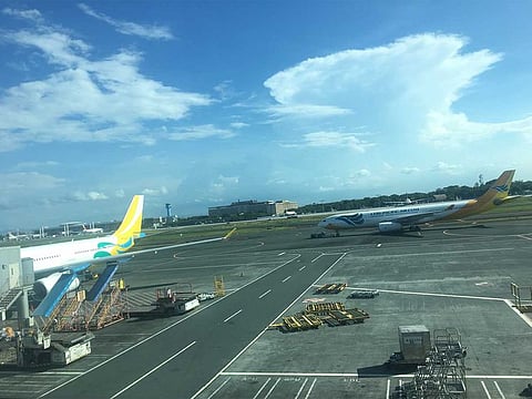 Staying put... Cebu Pacific aircraft at Terminal 3 of Manila's Ninoy Aquino International Airport.