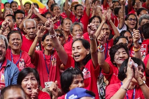 Filipino supporters of former First Lady Imelda Marcos celebrate her 90th birthday, a day ahead of her birthday, in Manila, Philippines, July 1, 2019 (issued July 2, 2019).