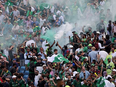 Pakistani cricket fans celebrate their team's victory during the World Cup match against and Afghanistan at Headingley in Leeds, on June 29, 2019.