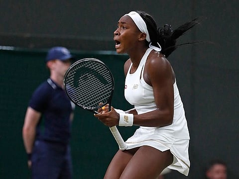 United States' Cori Gauff celebrates after beating Slovakia's Magdalena Rybaikova in a Women's singles match during day three of Wimbledon.