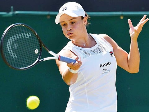 Australia’s Ashleigh Barty returns the ball against Belgium’s Alison van Uytvanck on Thursday.