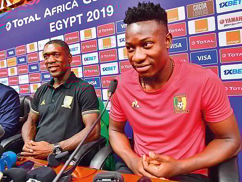 Cameroon goalkeeper Andre Onana (right) and coach Clarence Seedorf at a press conference in Alexandria, Egypt, yesterday. Cameroon face Nigeria on Saturday.