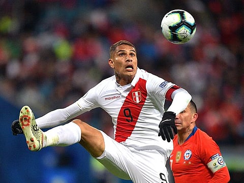 Peru's Paolo Guerrero controls the ball over Chile's Gary Medel during their Copa America football tournament semi-final match at the Gremio Arena in Porto Alegre, Brazil, on July 3, 2019.
