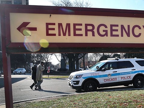 A police vehicle sits outside of Mercy Hospital in Chicago, Illinois