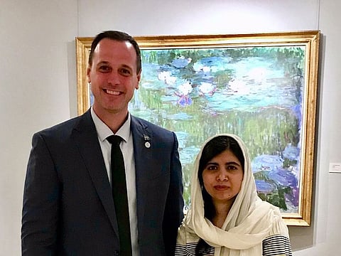 Jean-Francois Roberge, the Education Minister of Canada’s Quebec province, with Nobel Prize-winning human rights activist Malala Yousafzai