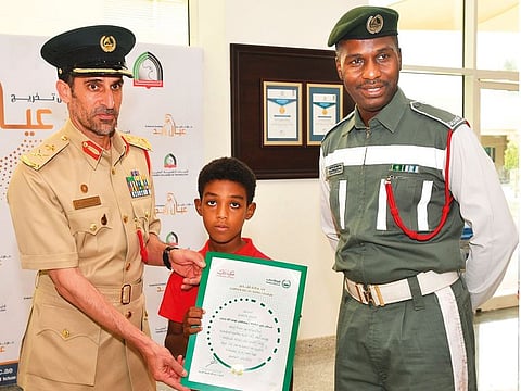 Maj Gen Abdullah Khalifa Al Merri honored policeman Mustafa Awad Yehia, from Traffic Department in Dubai Police, in the presence of Yehia’s son.