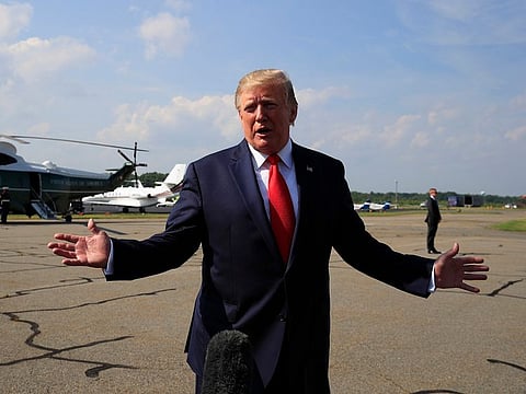 President Donald Trump speaks at Morristown Municipal Airport in Morristown, N.J., on his way returning back to the White House, Sunday, July 7, 2019.