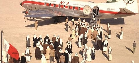 Passengers boarding a Middle East Airlines flight at Dubai International Airport.