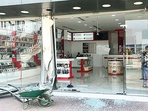 A shop was damaged in Umm Al Quwain after a motorist accidentally drove through the electronics store.