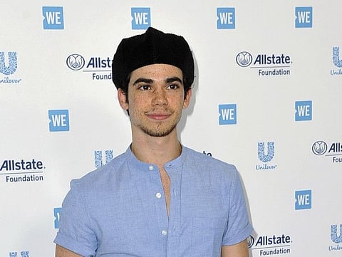 Cameron Boyce arrives at WE Day California at The Forum on Thursday, April 25, 2019, in Inglewood, Calif. (Photo by Richard Shotwell/Invision/AP)