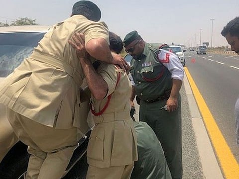 Four Dubai Police officials stopped to help a Dubai-based resident Nadeem Gazdar change his car tyre.
